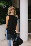 black fringed top